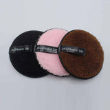 MoMineral UK Three reusable microfiber face cleansing puff pads in black, brown, and pink